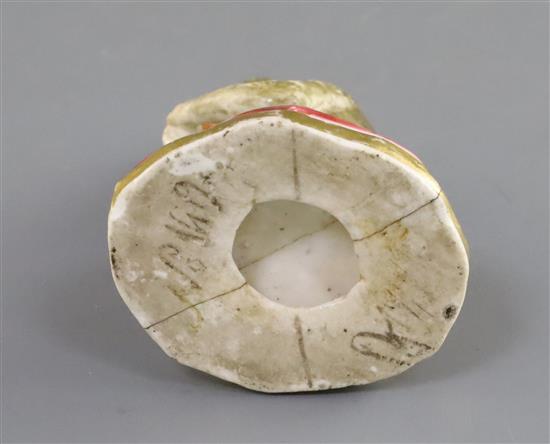 A Rockingham porcelain figure of a seated monkey, c.1830, H. 7.1cm, repaired